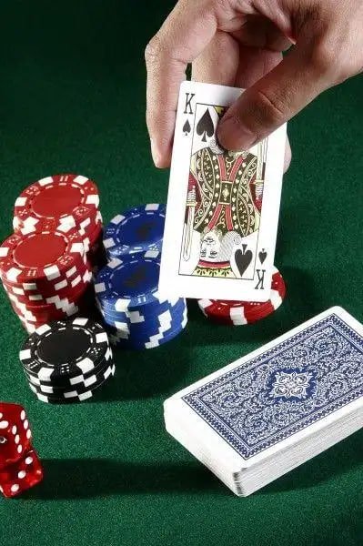 Live Bandar Poker dealer at bacan4d login studio displaying dealt hands on HD camera